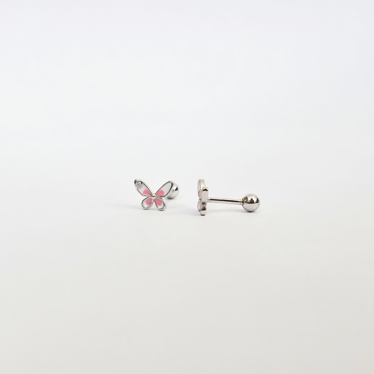 Silver butterfly stud earrings with pink gemstone accents.