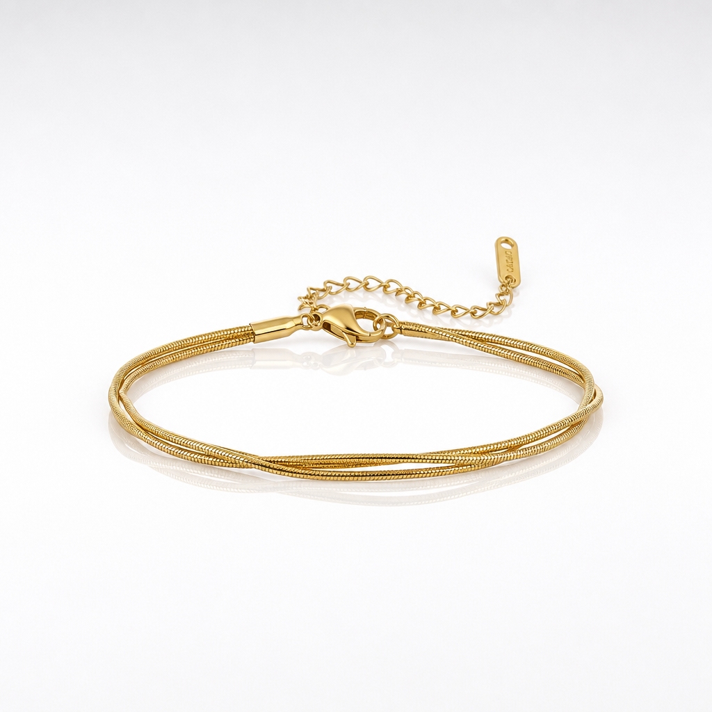 A gold snake chain anklet with a lobster clasp and extension chain, displayed on a clean white background.