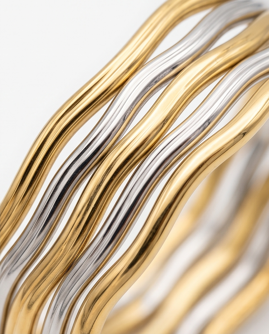 Sculpted Wave Stainless Steel Bangle – Gold & Silver