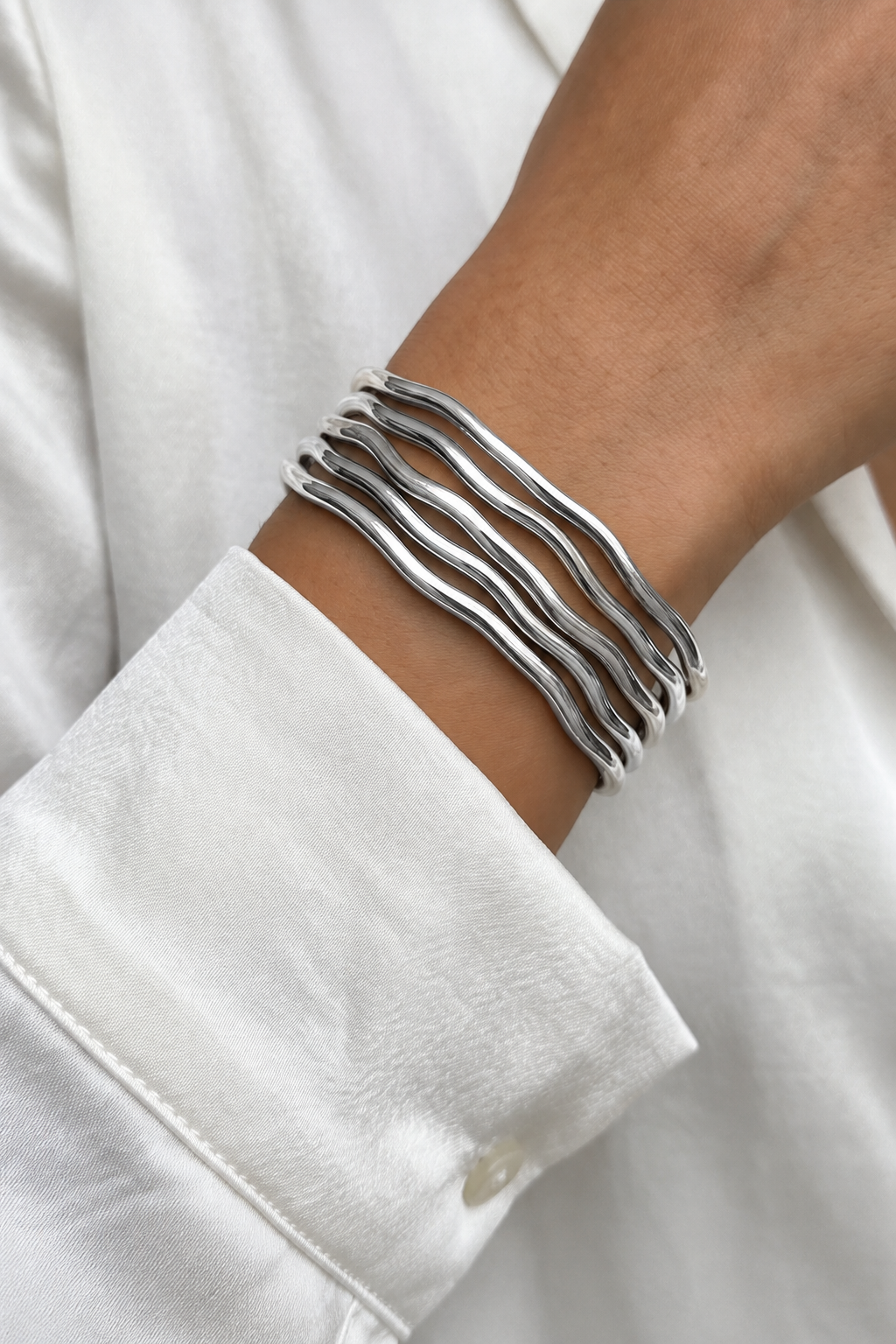 Sculpted Wave Stainless Steel Bangle – Gold & Silver