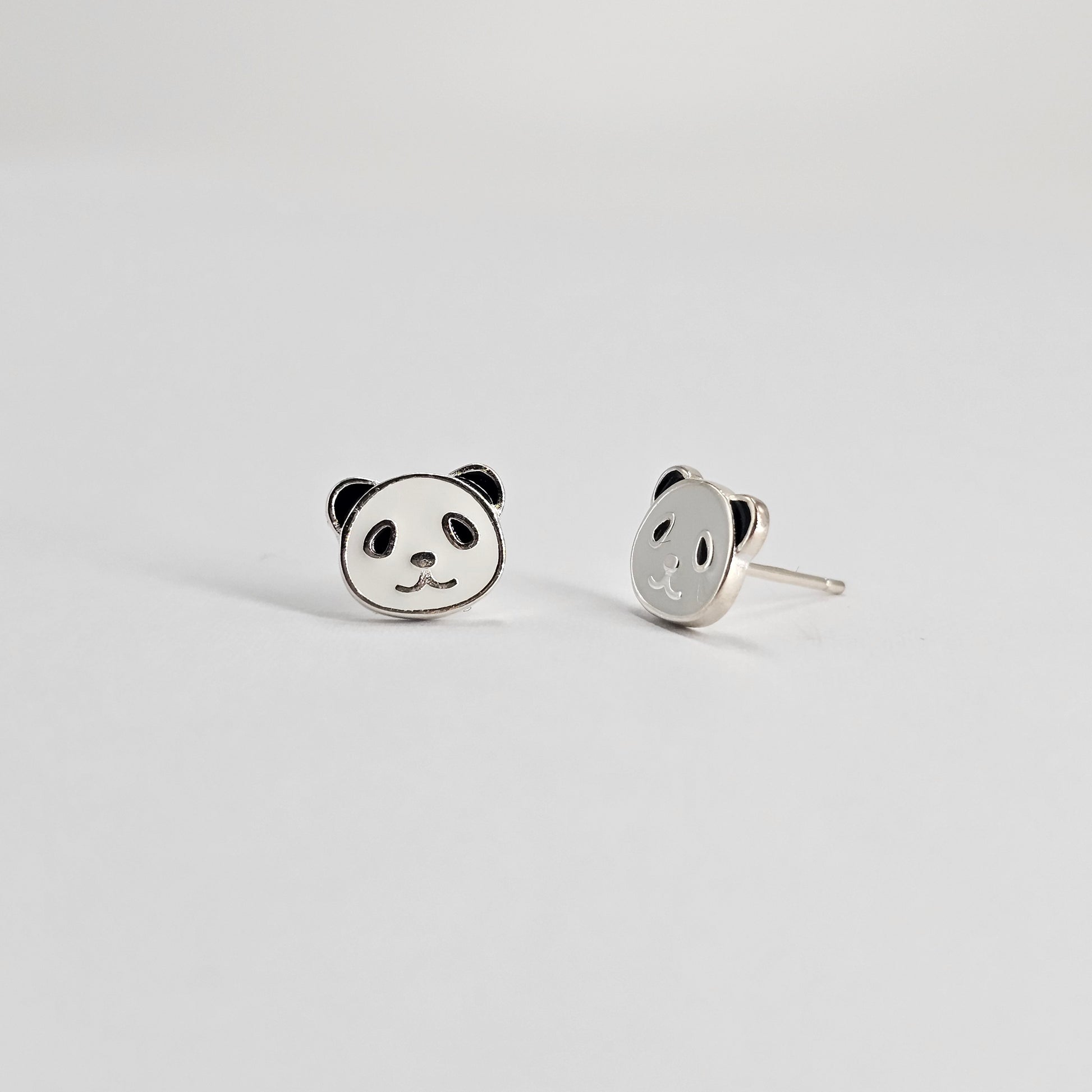 Silver panda stud earrings in stainless steel, elegant unisex fashion jewelry for kids.