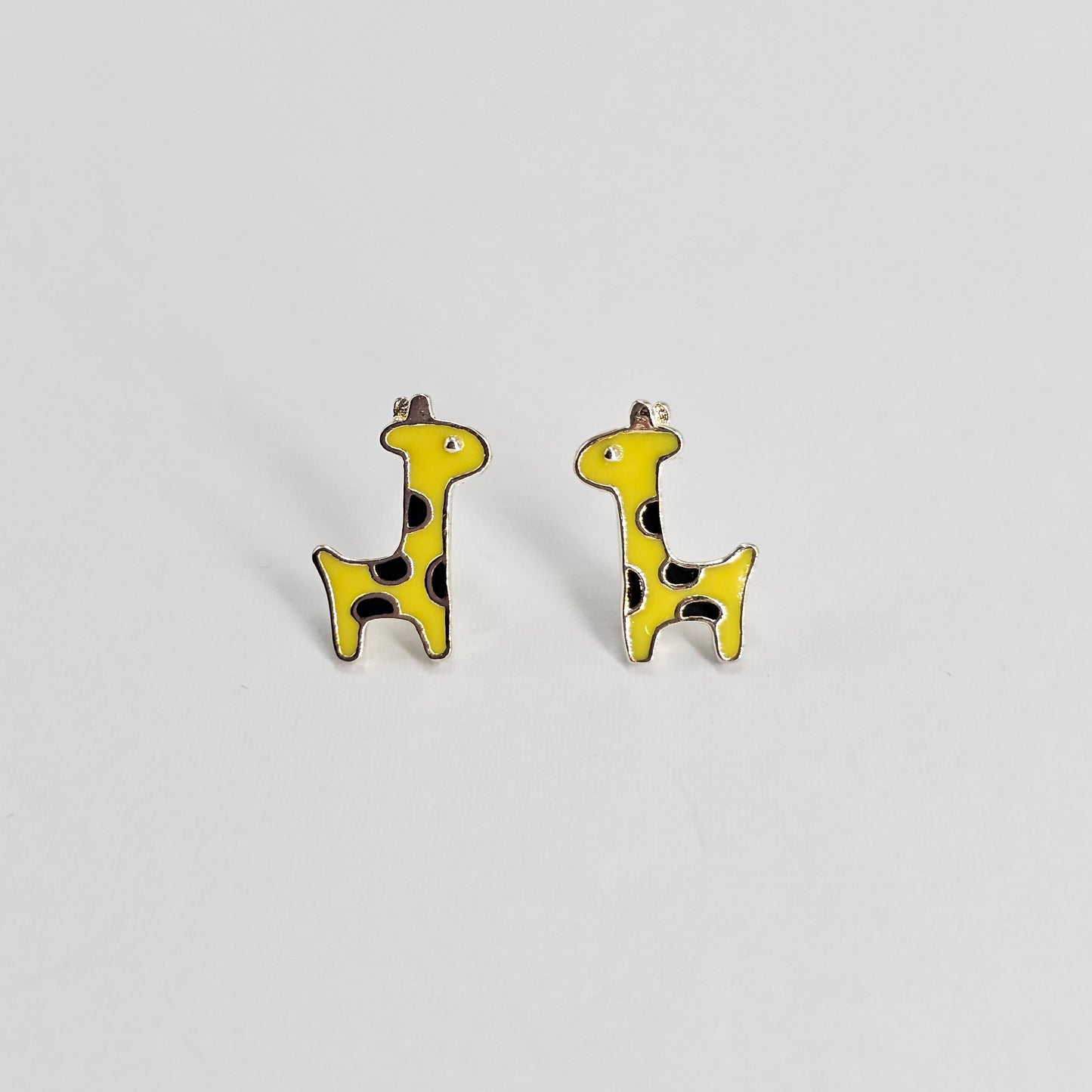 Yellow and black giraffe-shaped kids earrings in stainless steel jewelry, unisex fashion jewelry design.