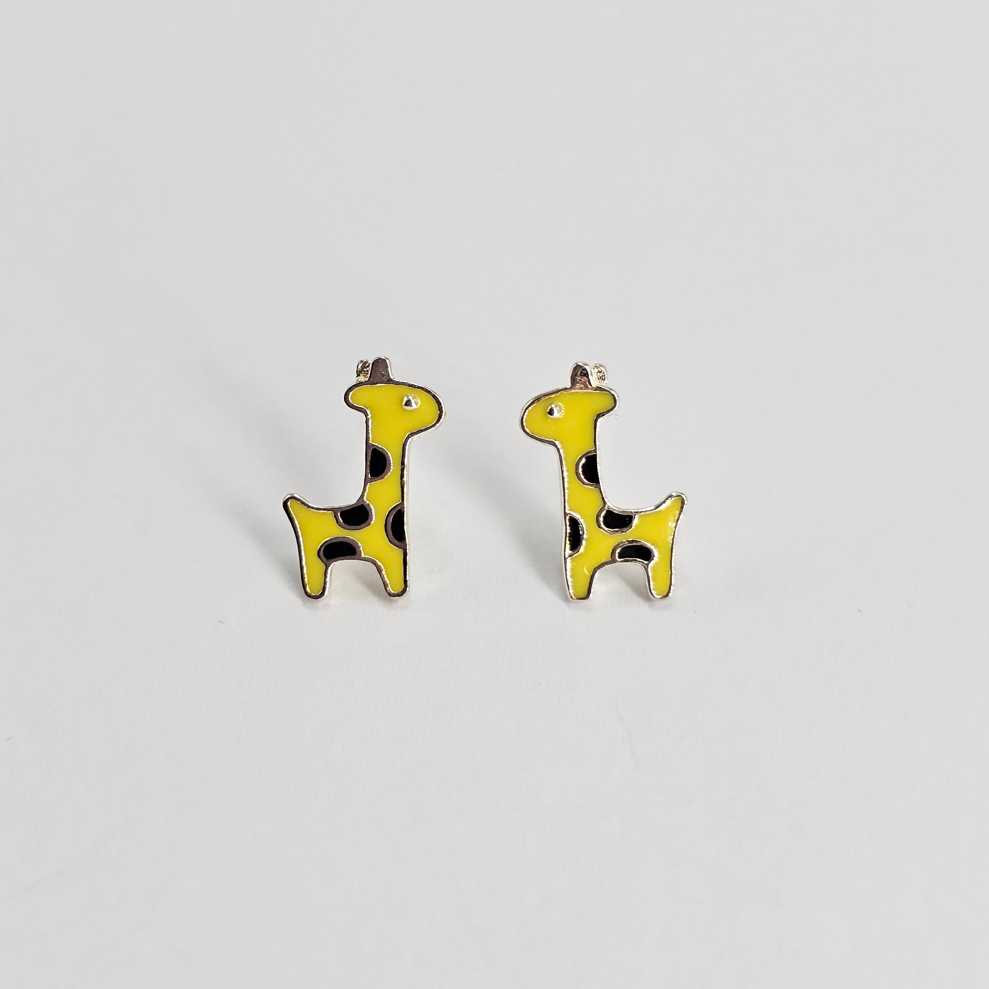 Yellow and black giraffe-shaped kids earrings in stainless steel jewelry, unisex fashion jewelry design.