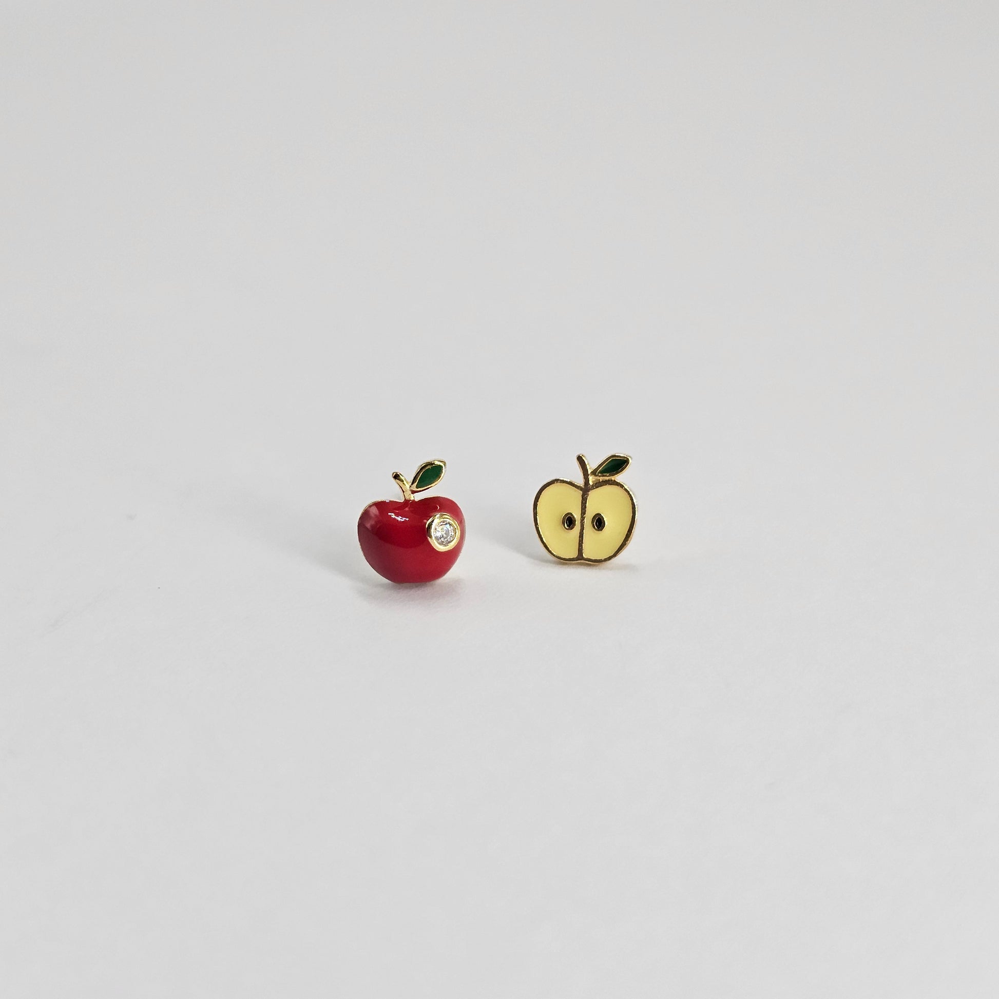 Kids stainless steel apple earrings in red and gold with gemstone accents, stylish silver jewelry.