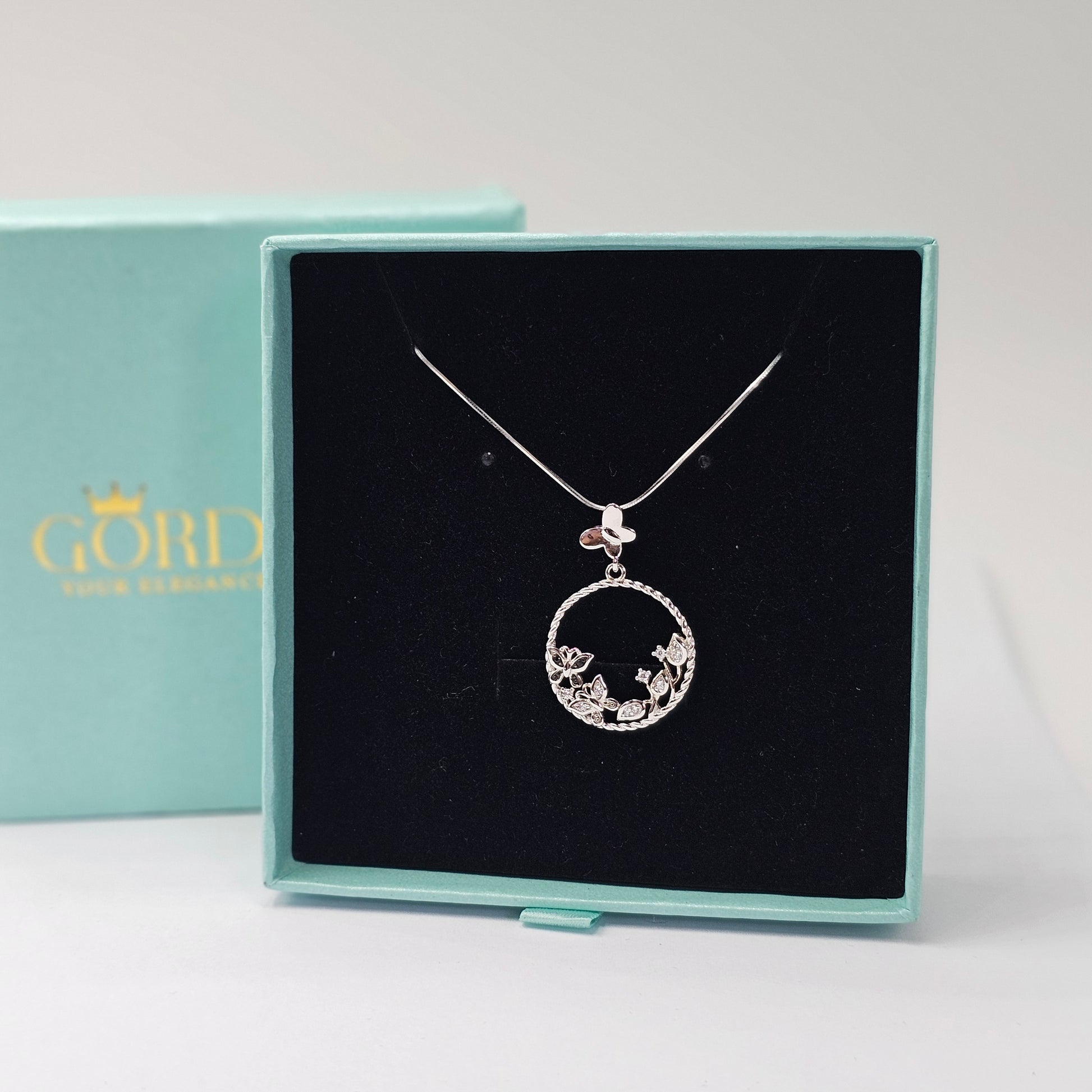 Silver stainless steel butterfly necklace with gemstone accents, elegant unisex fashion jewelry from Mauritius Europe USA.