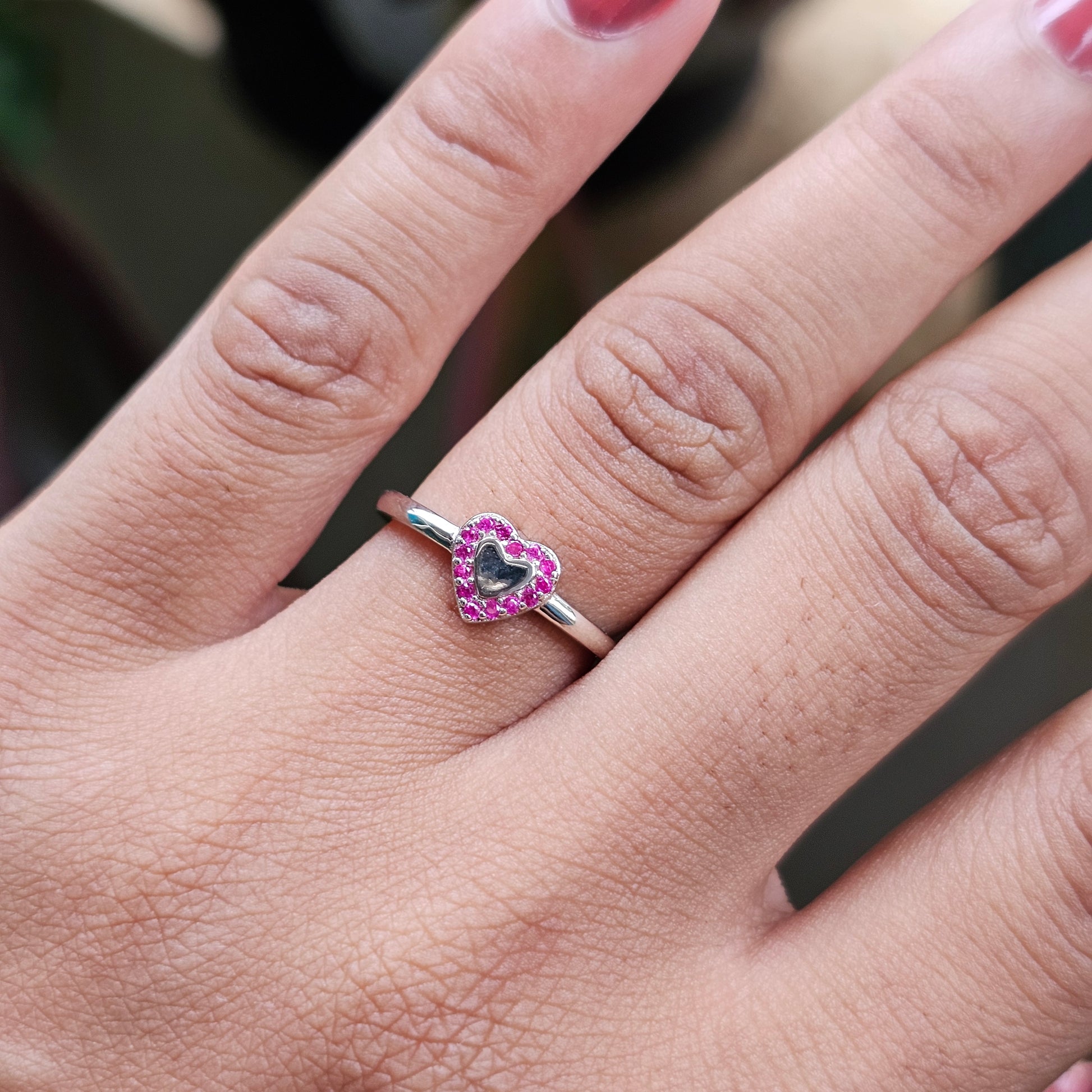 Silver jewelry ring with heart-shaped pink gemstone, stainless steel, unisex fashion jewelry.