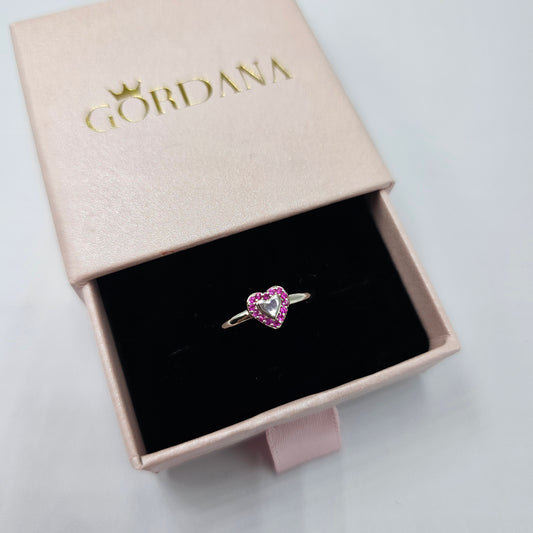 Silver jewelry heart-shaped ring with pink gemstone, stainless steel fashion jewelry, unisex style.