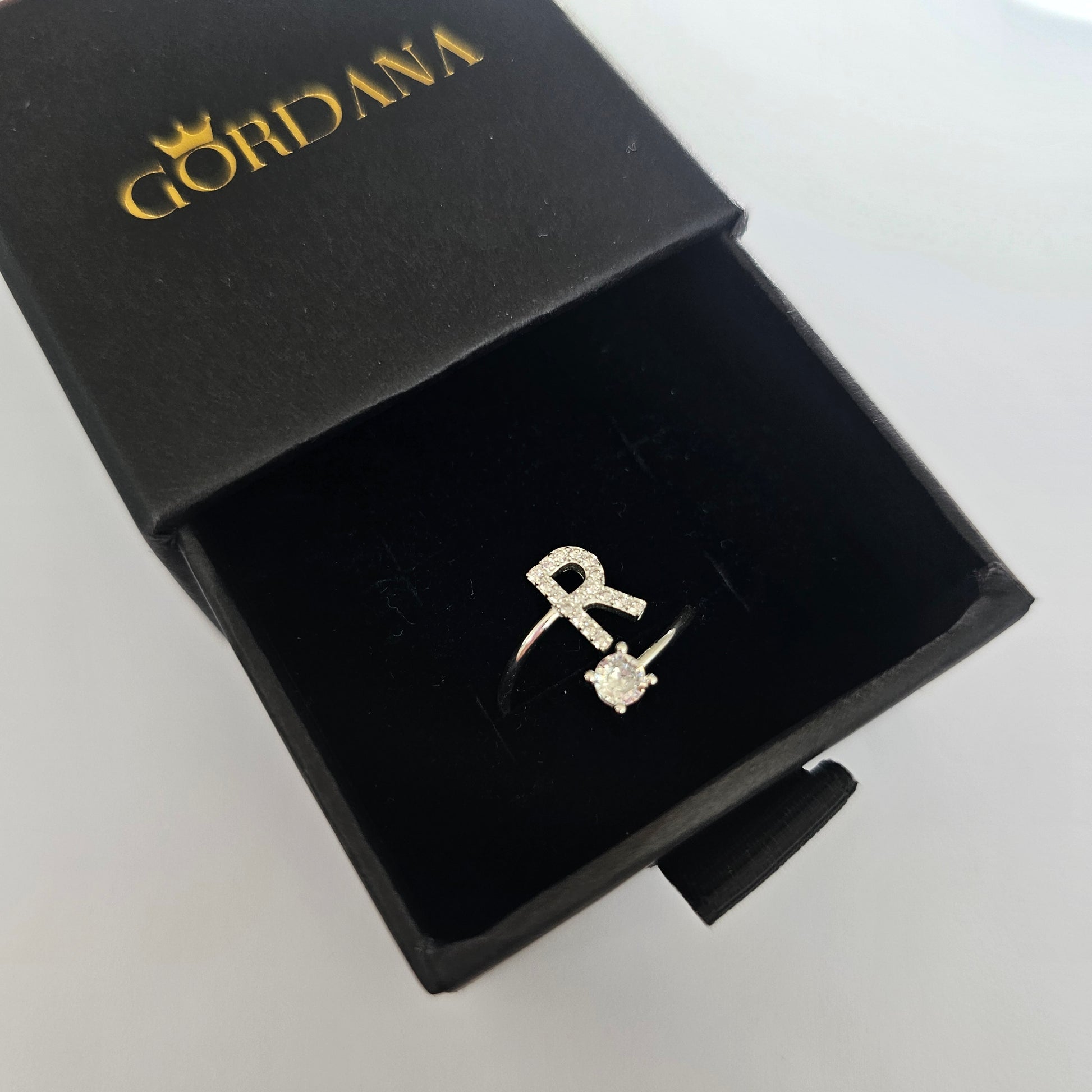 Silver jewelry alphabet ring "R" in elegant stainless steel, unisex fashion jewelry in black gift box, Mauritius Europe USA.