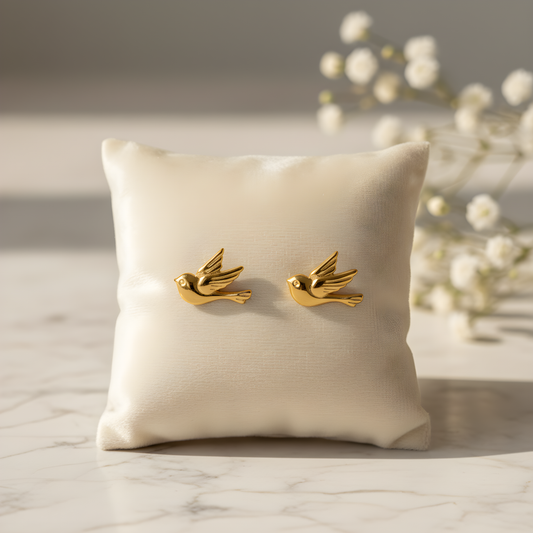 Gold plated stainless steel bird design stud earrings for woman. 