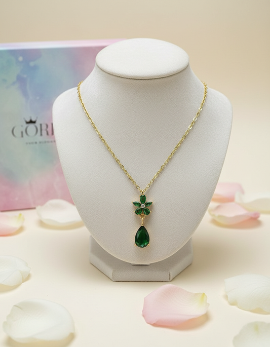 Necklace with a green pendant on a mannequin bust with a soft  background Green Flower Necklace