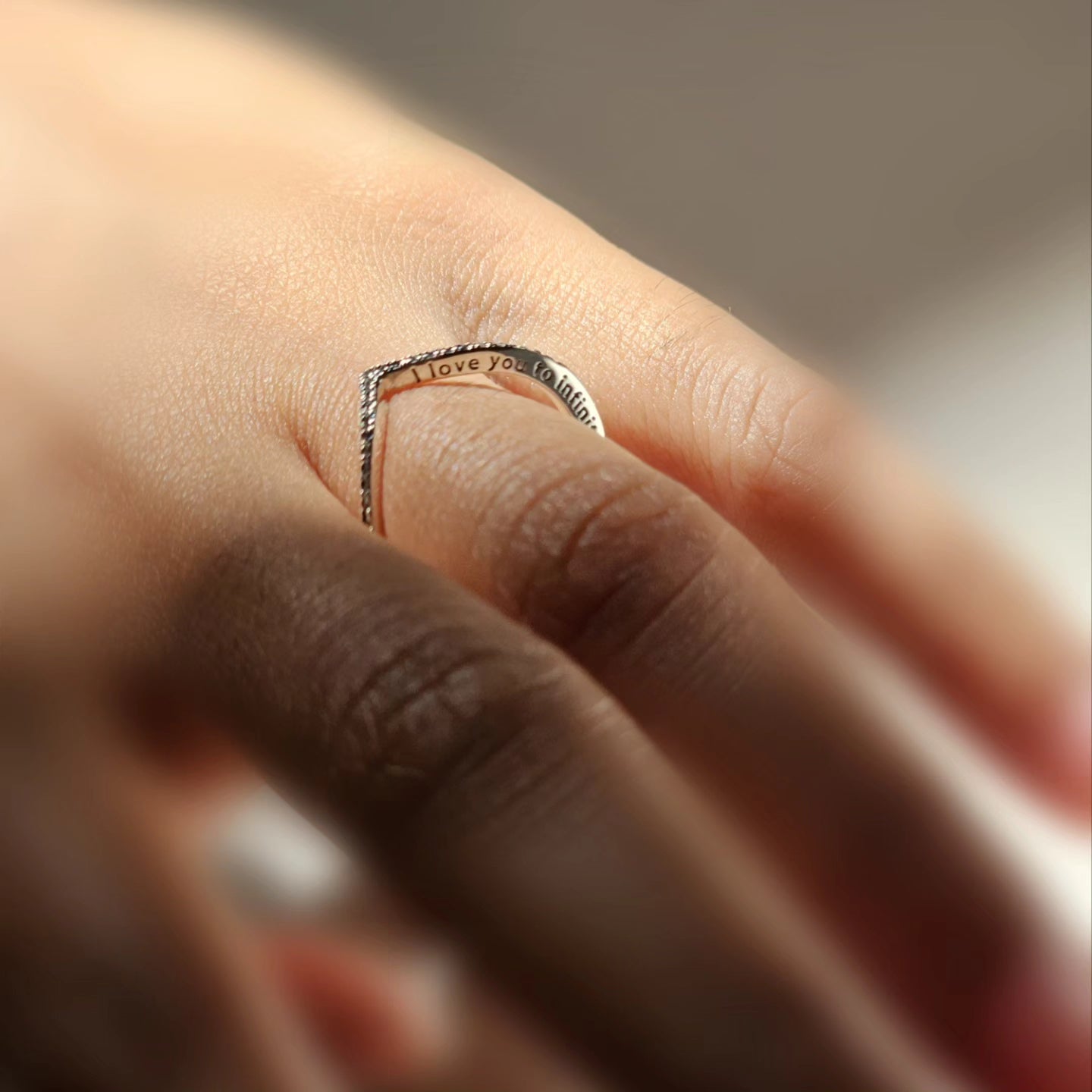 Elegant silver jewelry ring with engraved "I love you to infinity and beyond," unisex stainless steel fashion jewelry,.