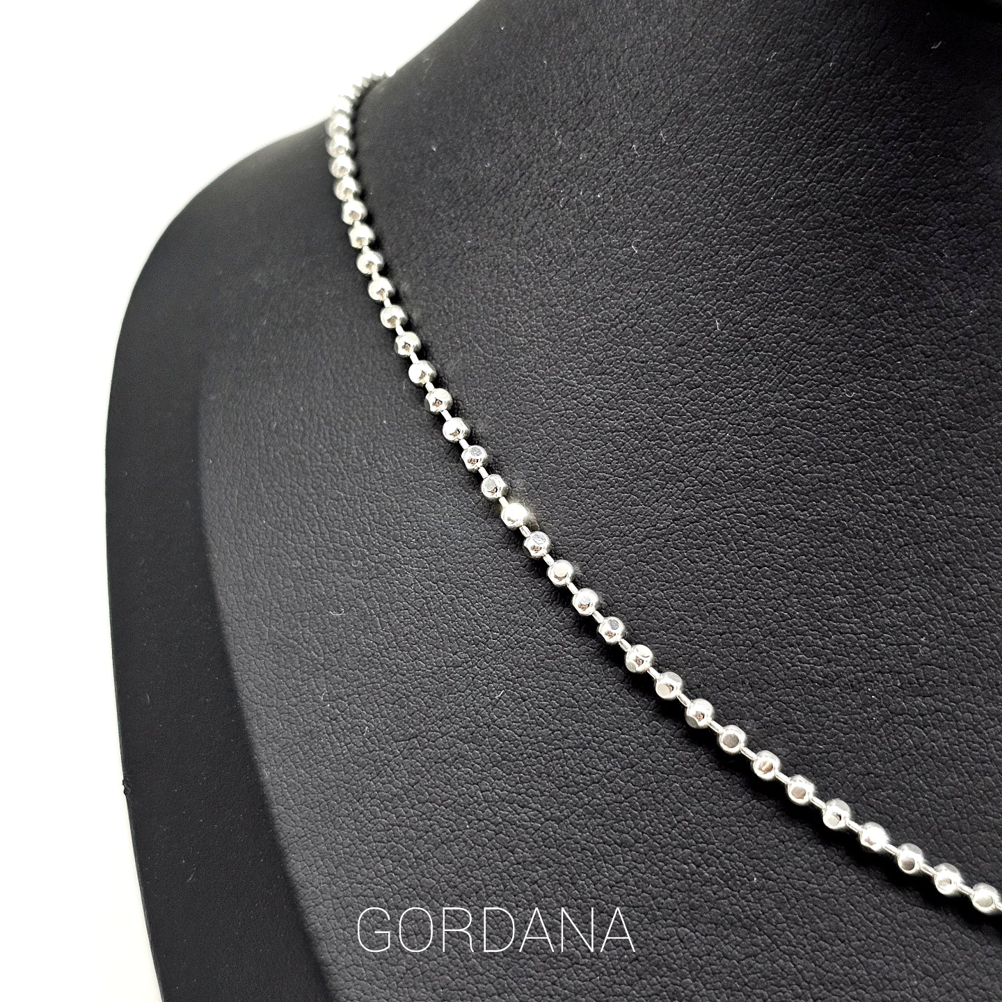 Elegant silver necklace with polished round beads, stainless steel jewelry, unisex fashion jewelry.