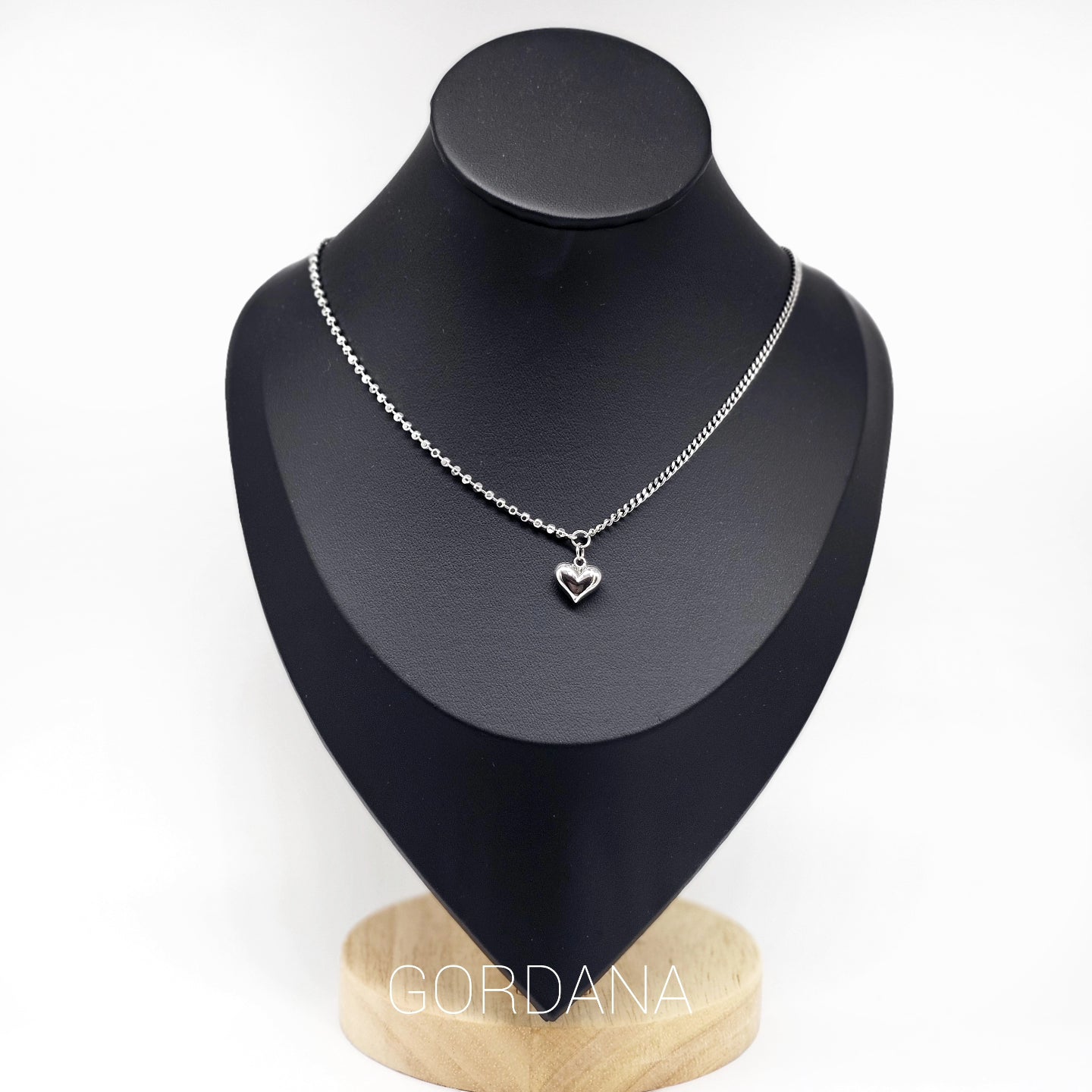 Elegant silver necklace with heart-shaped gemstone pendant, stainless steel jewelry, unisex fashion jewelry, Mauritius.