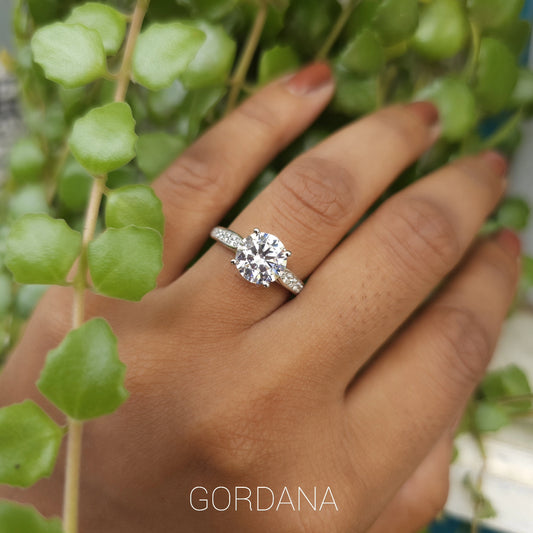 Silver jewelry ring with a large round gemstone, elegant stainless steel design, unisex fashion jewelry perfect for.