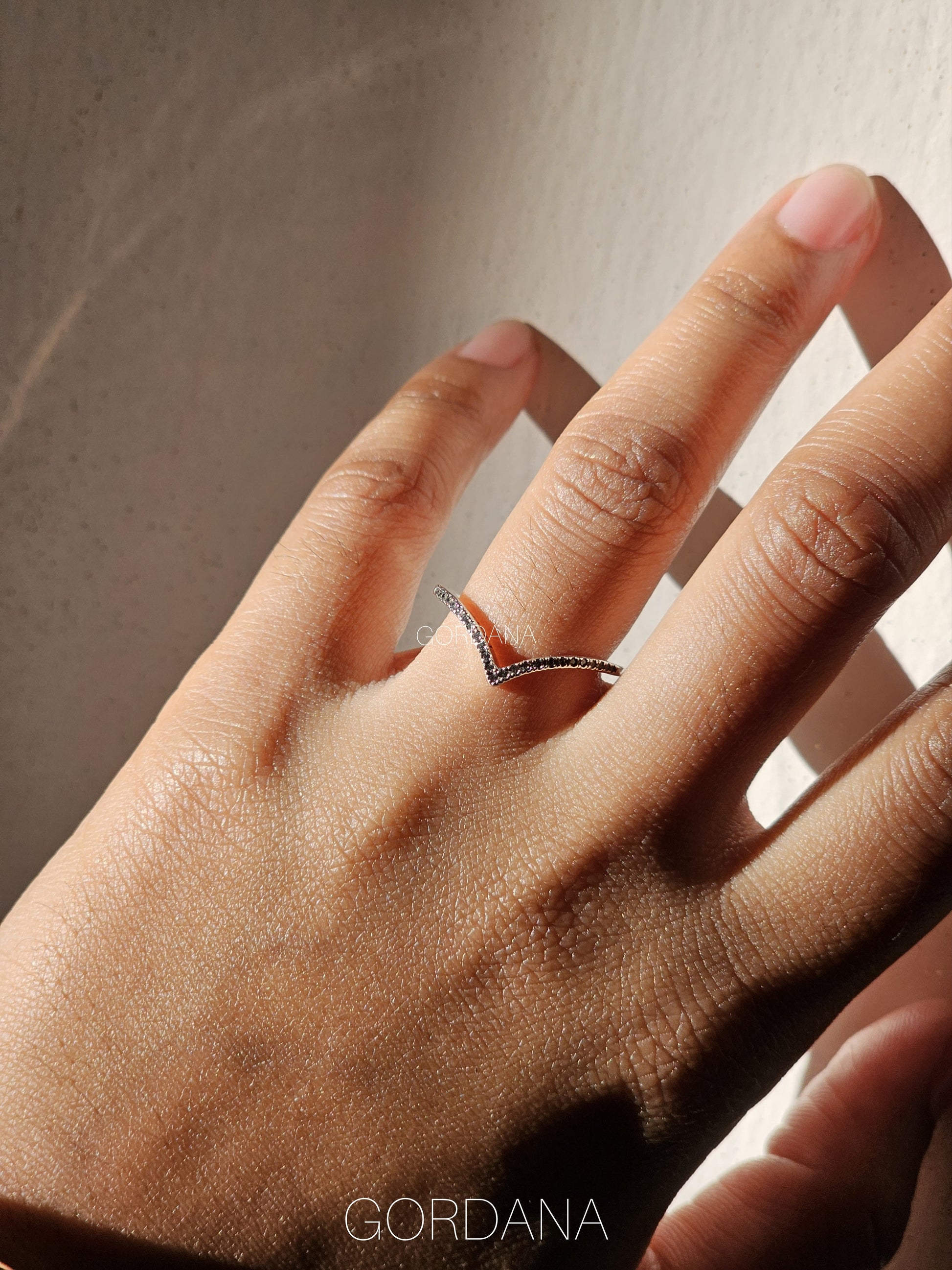 Elegant silver stainless steel ring with a minimalist V-shaped design, unisex fashion jewelry suitable for Mauritius,.