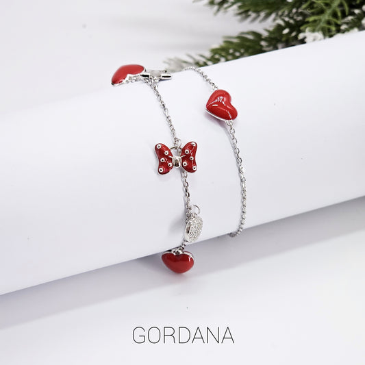 Silver bracelet with red heart charms and butterfly pendant, stainless steel unisex fashion jewelry.