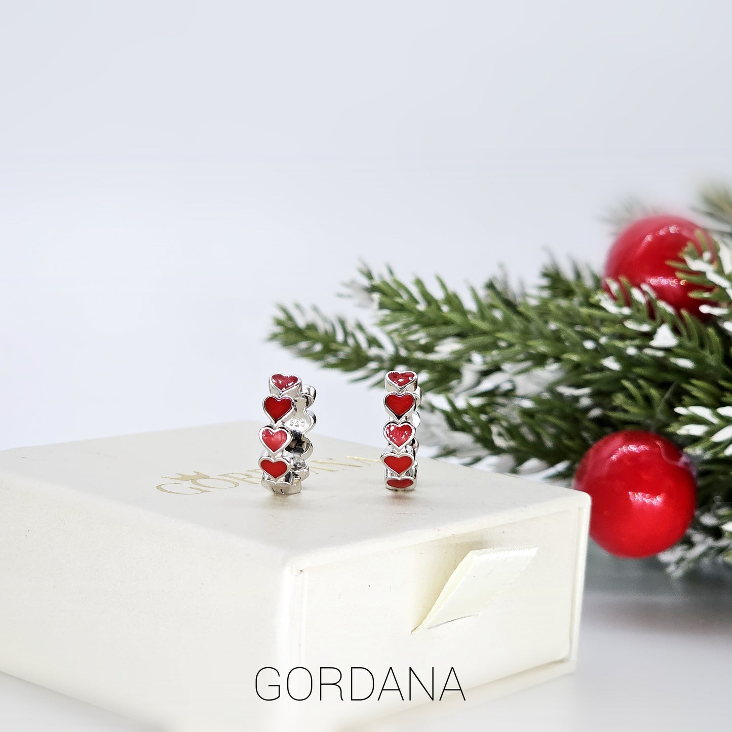 Silver stainless steel Juliette earrings featuring red heart-shaped gemstones, unisex fashion jewelry with Mauritius Europe.