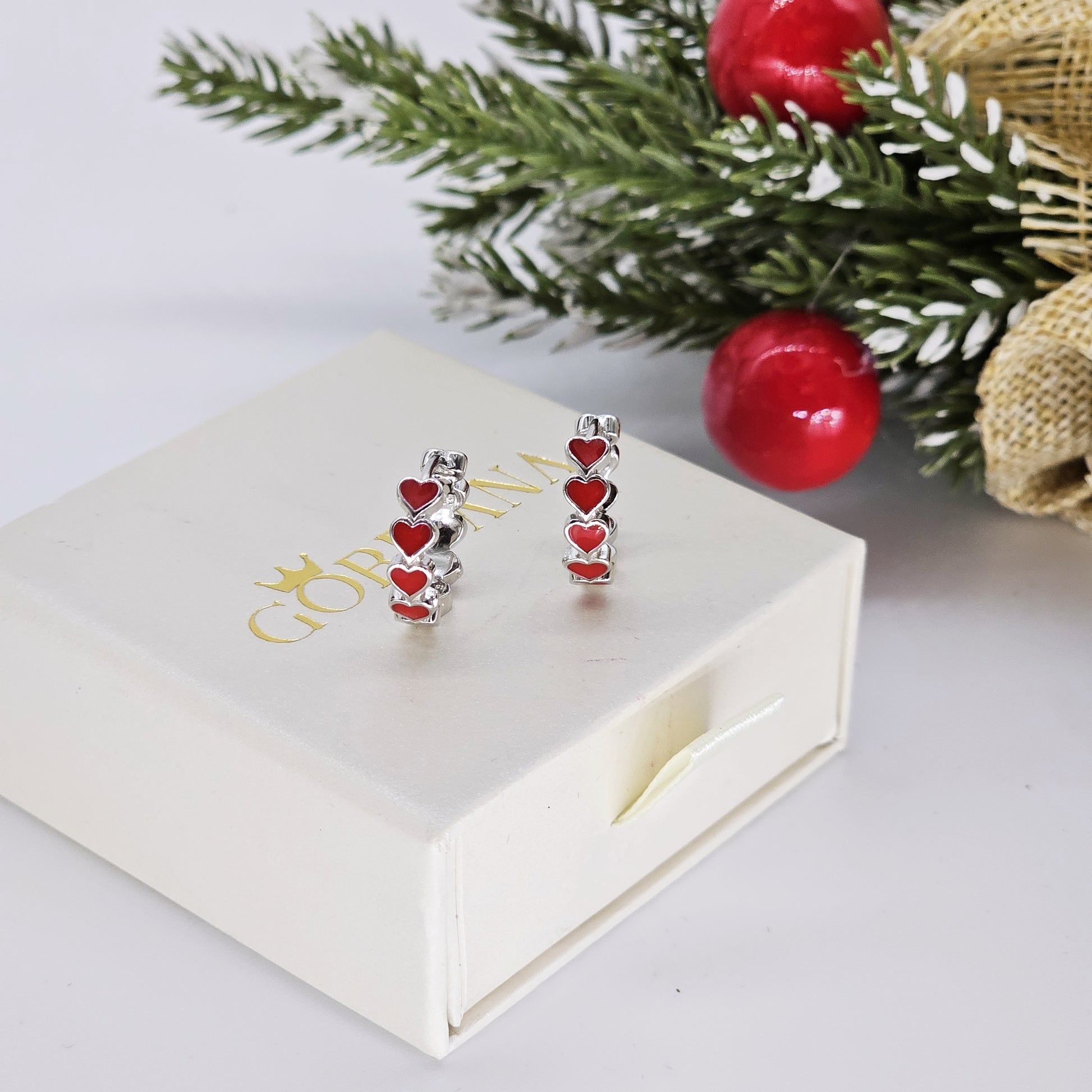 Silver Juliette earrings with red heart gemstones, stainless steel fashion jewelry, unisex style for Mauritius, Europe, USA.