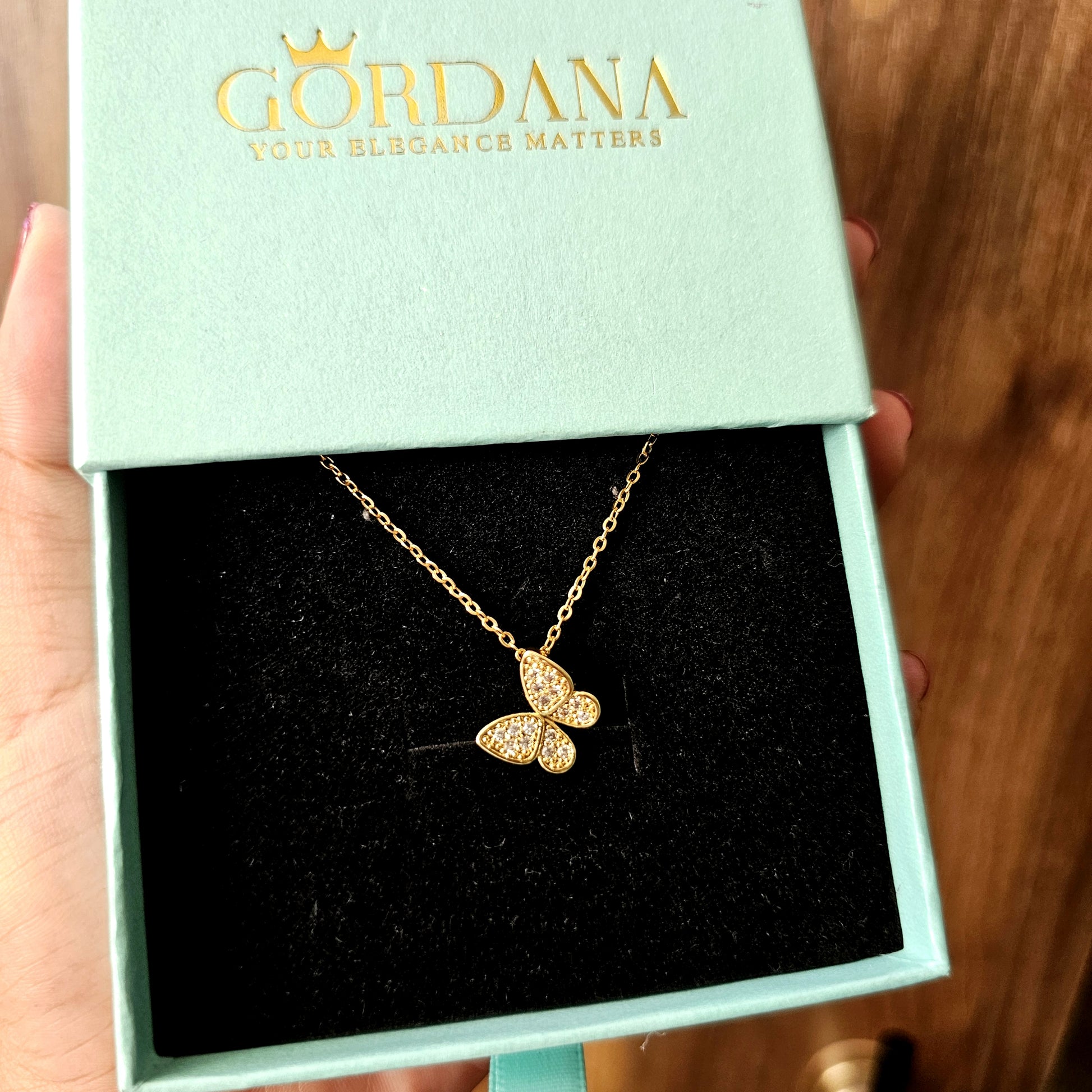 18k gold plated stainless steel butterfly necklace with sparkling gemstone accents, unisex fashion jewelry.