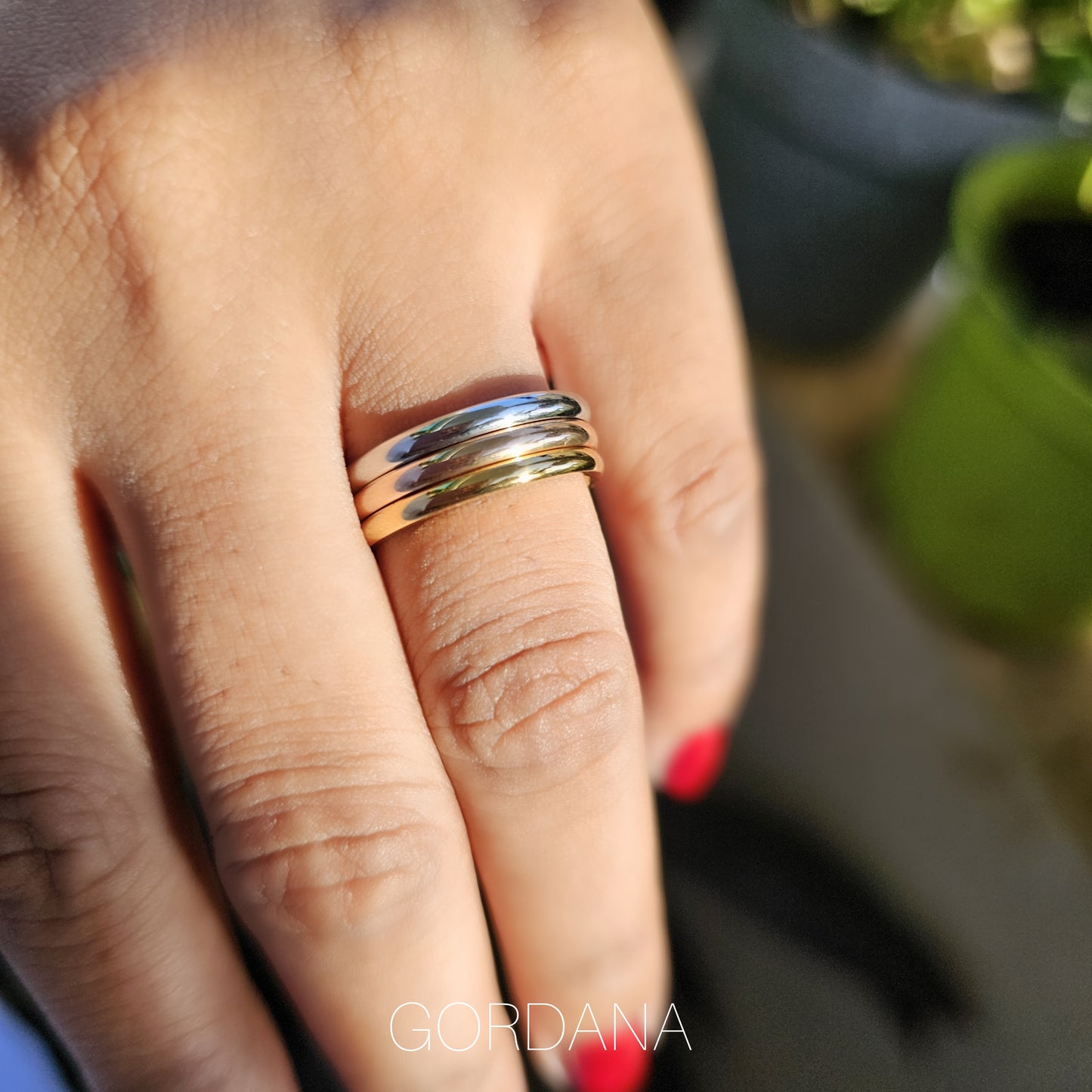 Dainty trio set of 18K gold plated stainless steel rings with a sleek, modern design, unisex fashion jewelry perfect for.