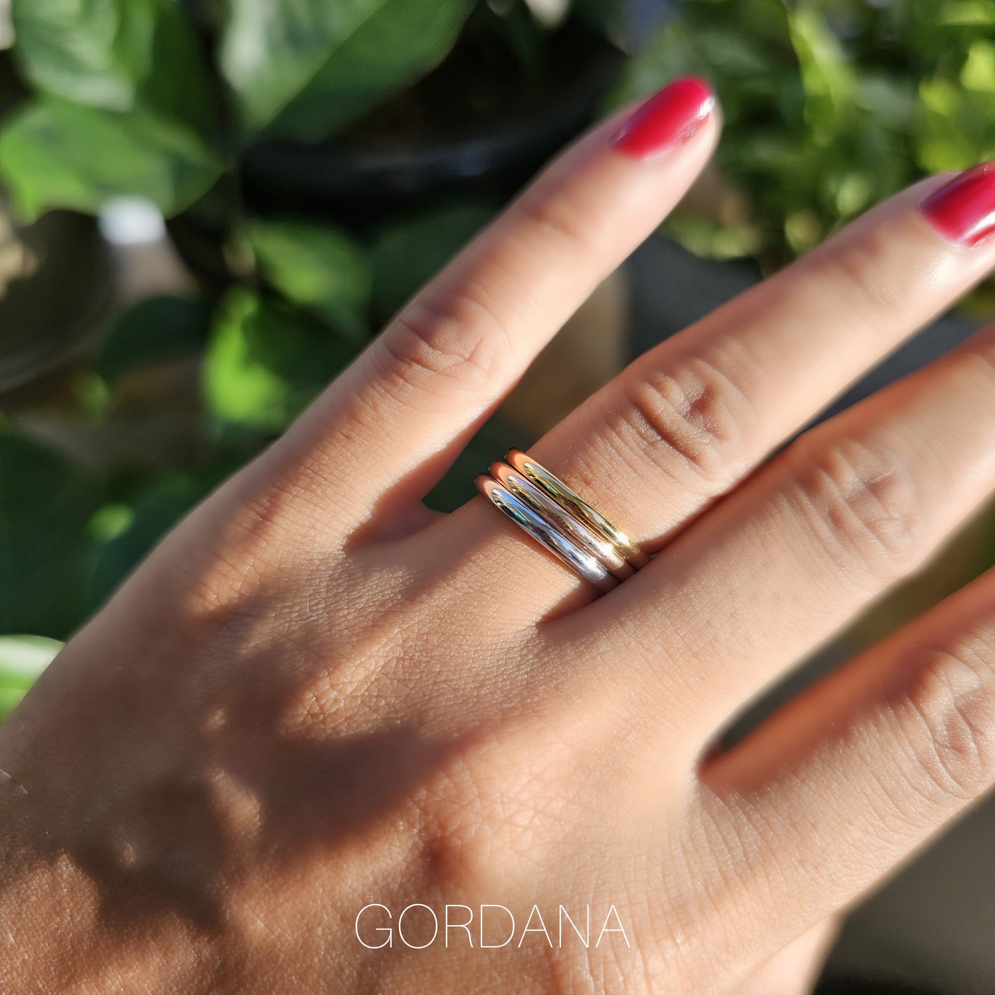 Dainty trio set of stainless steel 18K gold plated rings with silver and gemstone accents, unisex fashion jewelry inspired.