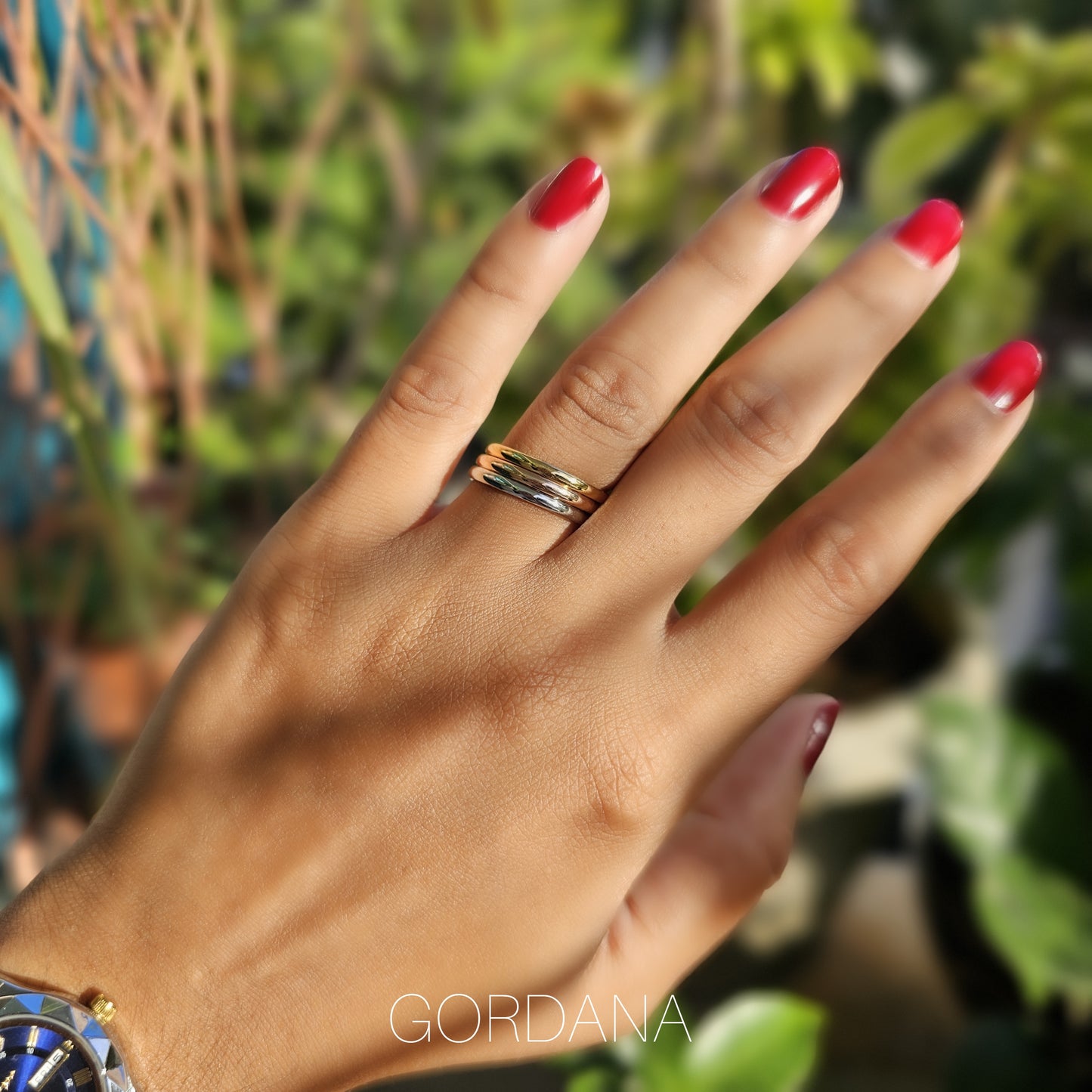 Elegant dainty trio set of 18K gold plated stainless steel rings with minimalist design, unisex fashion jewelry.