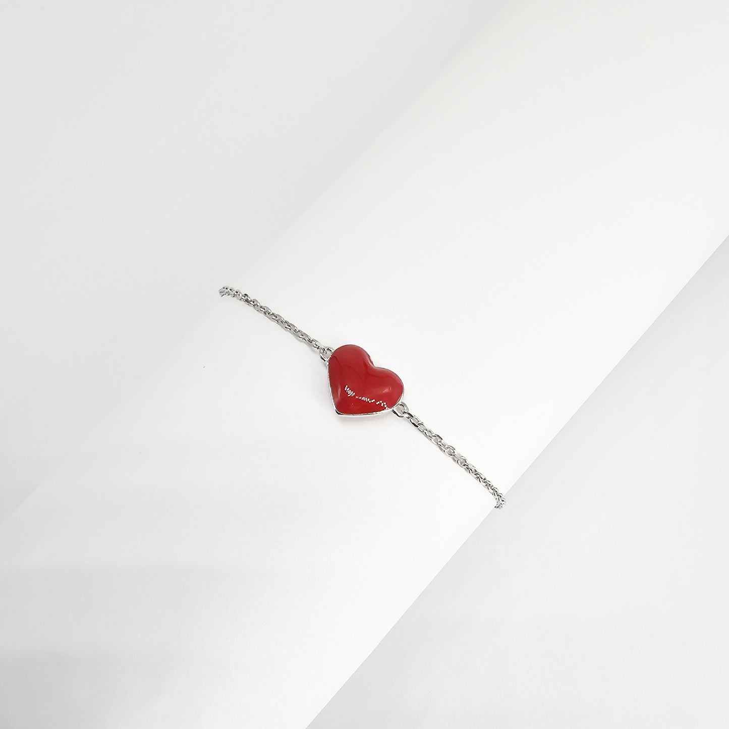 Silver jewelry bracelet with dainty red heart gemstone pendant, stainless steel fashion jewelry, unisex style for Mauritius.