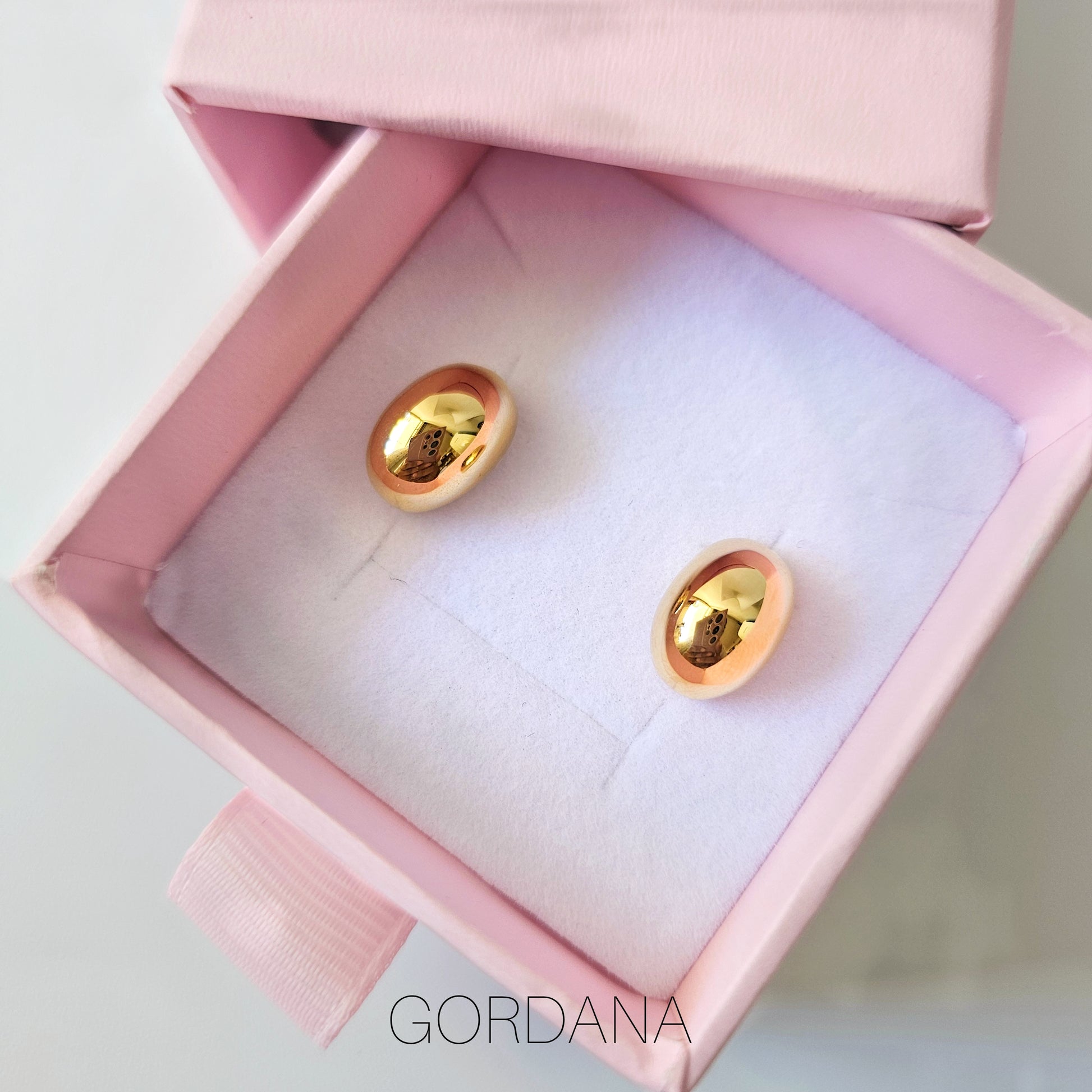 18K gold plated stainless steel bean-shaped earrings in pink jewelry box, unisex fashion jewelry.