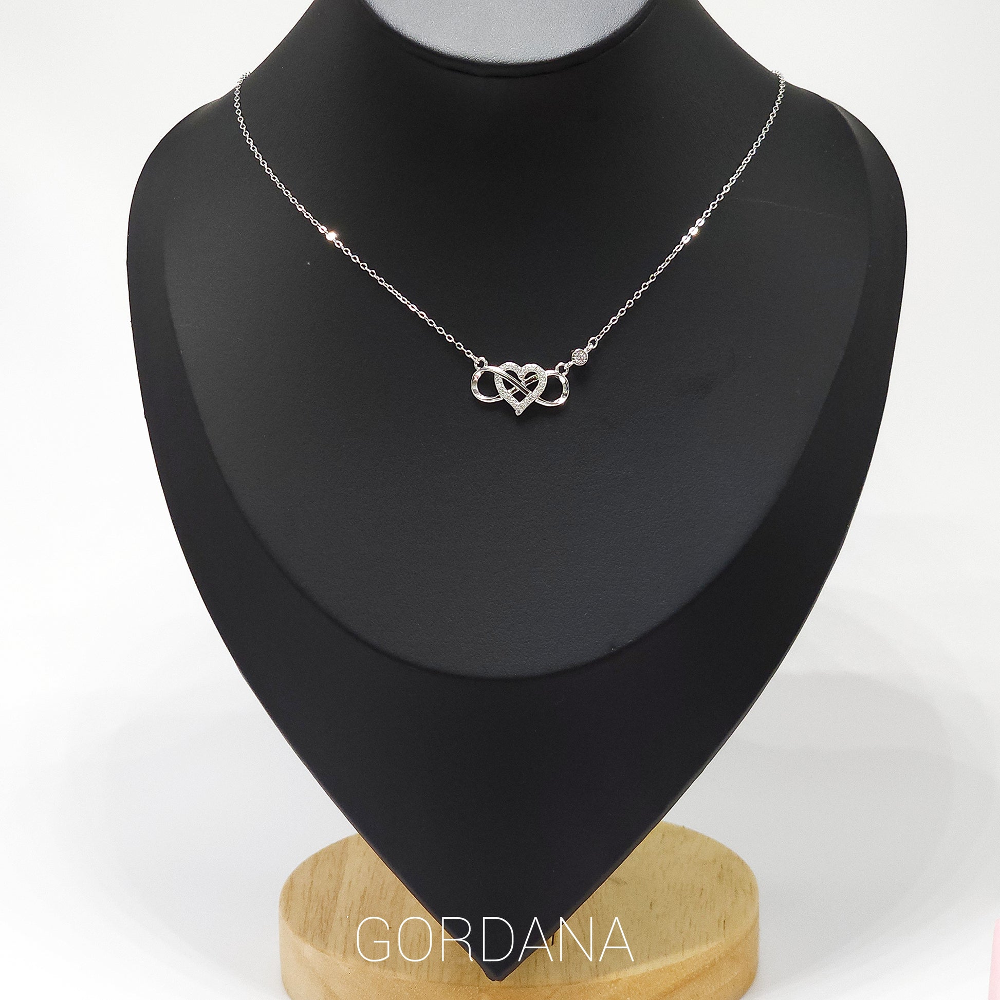 Silver jewelry unisex necklace with intertwined hearts pendant, stainless steel fashion jewelry, Mauritius Europe USA style.