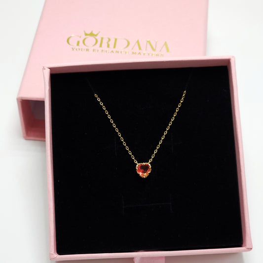 Silver jewelry necklace with red gemstone heart pendant, stainless steel, unisex fashion jewelry.