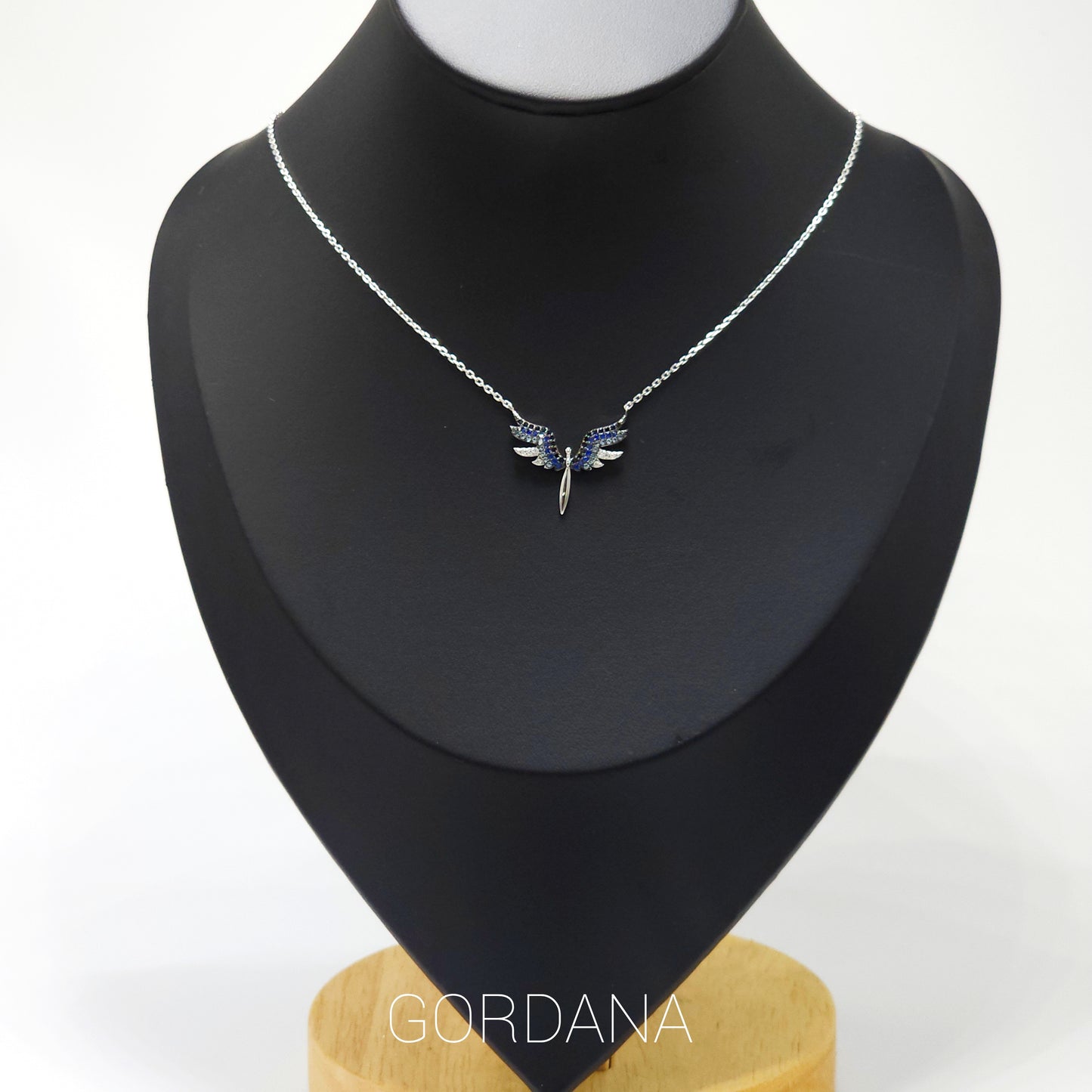 Silver angel wing necklace with gemstone accents, stainless steel jewelry, unisex fashion jewelry, Mauritius Europe USA style.