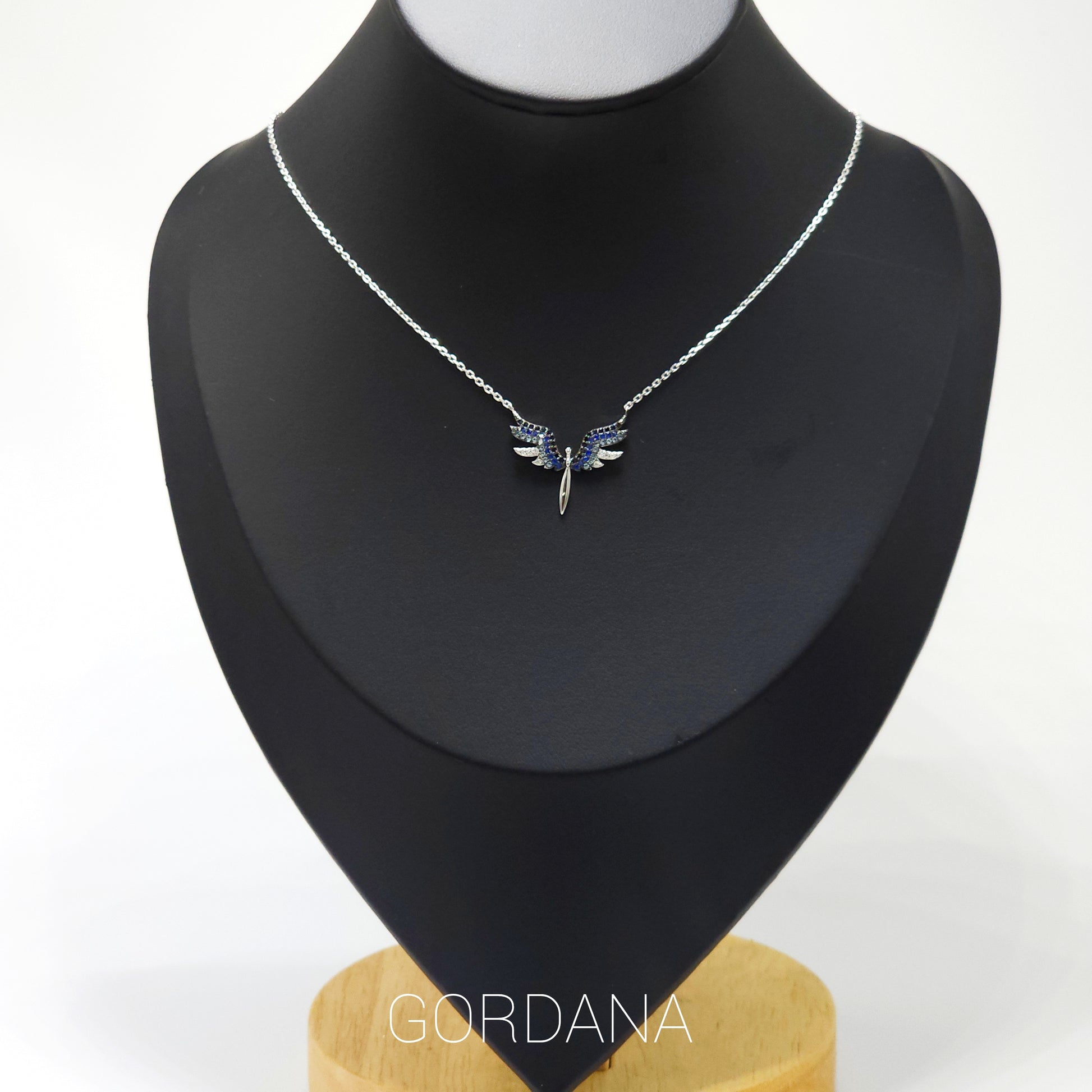 Silver angel wing necklace with gemstone accents, stainless steel jewelry, unisex fashion jewelry, Mauritius Europe USA style.