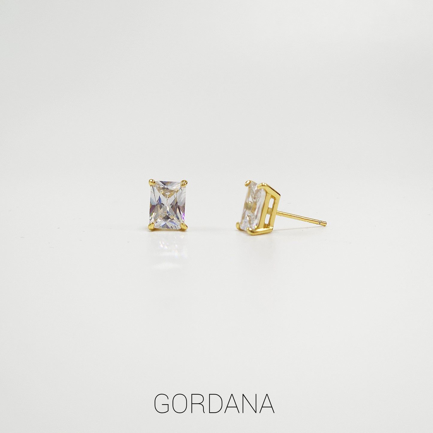 Elegant rectangular clear gemstone earrings in 18K gold plated stainless steel, unisex silver jewelry with Mauritius Europe.