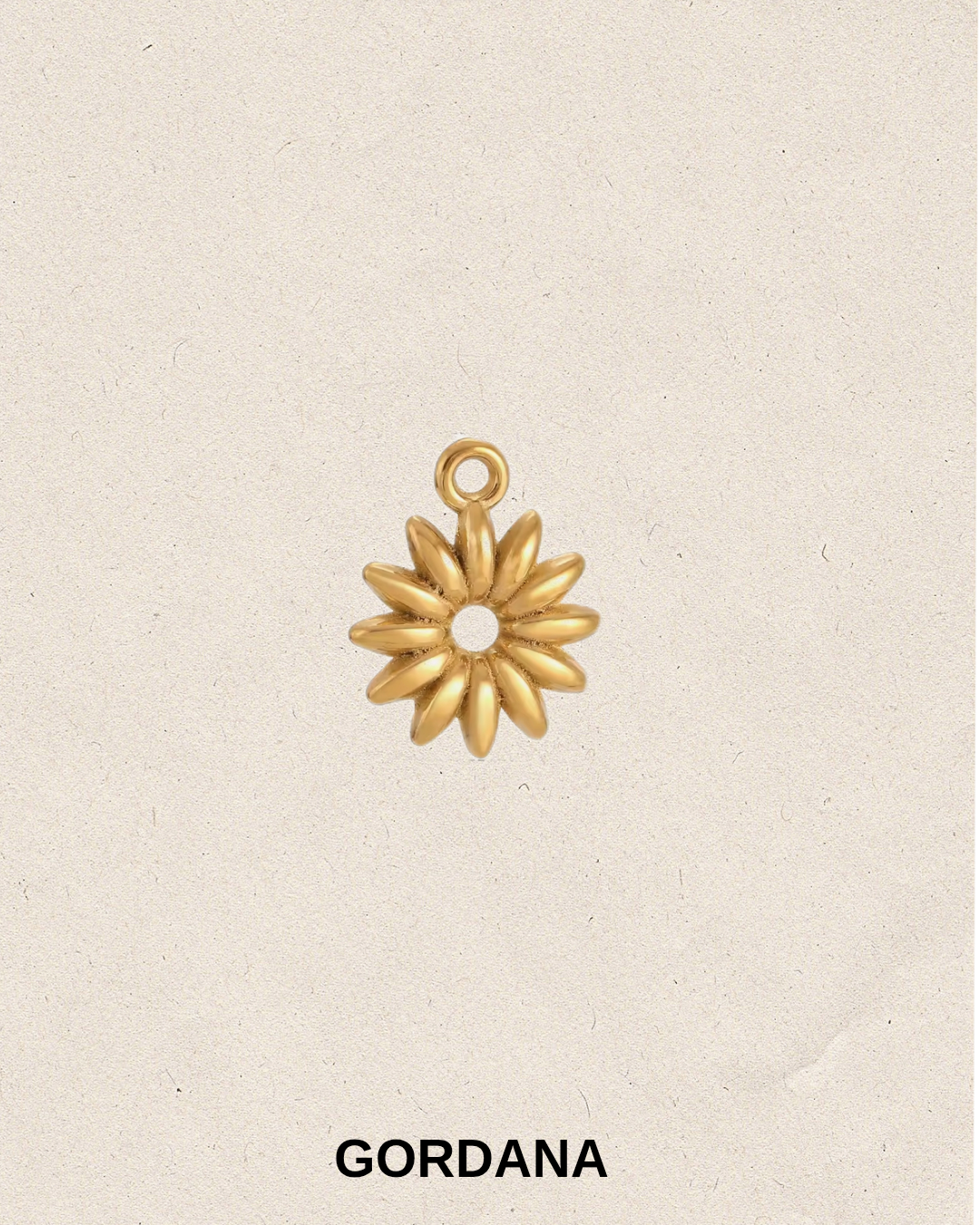 Gold plated stainless steel flower and sun charm for bracelets and pendant necklaces in Mauritius and France. 