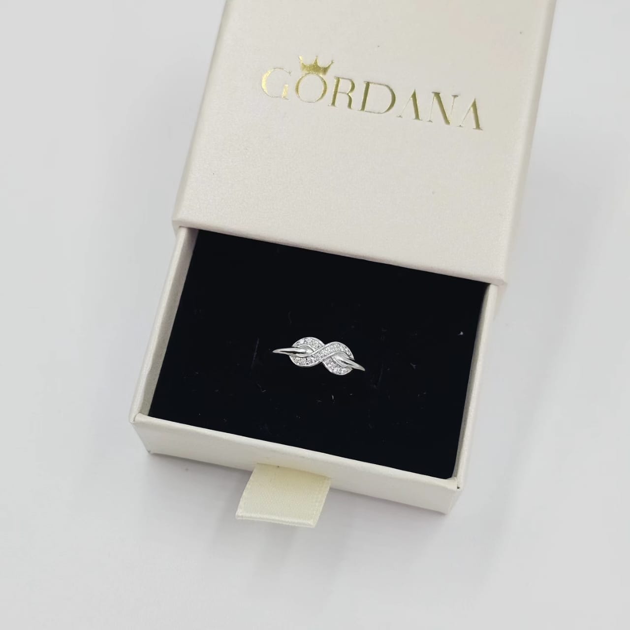 Silver stainless steel Infinity Promise Ring with elegant gemstone detail, unisex fashion jewelry in Mauritius Europe USA.