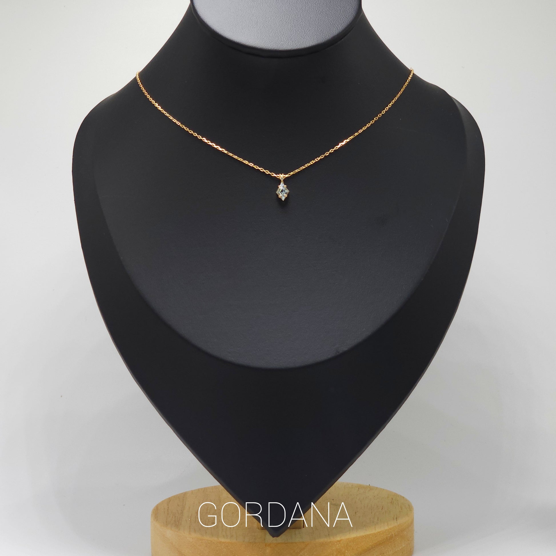 Delicate silver necklace with a sky blue topaz gemstone pendant, stainless steel jewelry, unisex fashion jewelry inspired by .