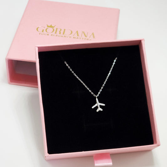 Silver airplane pendant necklace in black velvet, stainless steel jewelry, unisex fashion jewelry with Mauritius Europe USA.