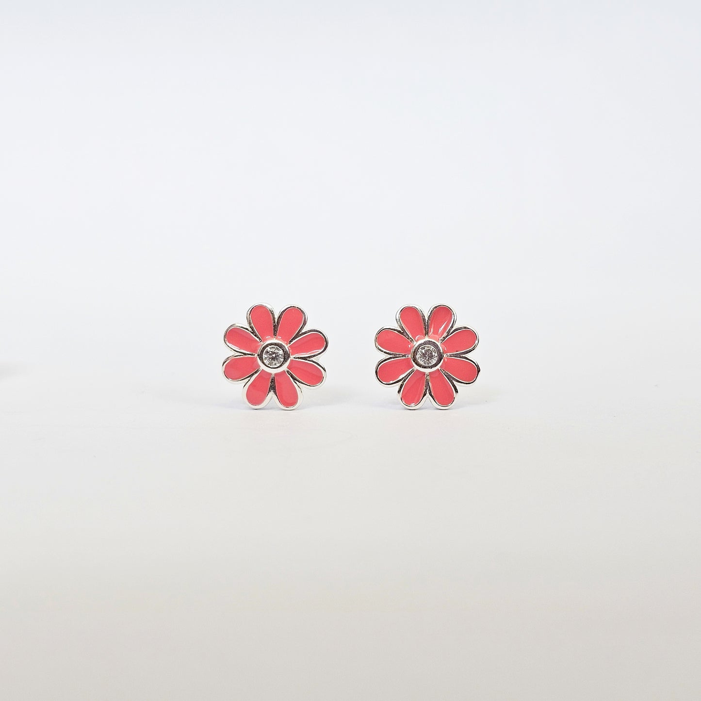 Silver jewelry pink daisy stud earrings with gemstone center, stainless steel fashion jewelry for unisex style.