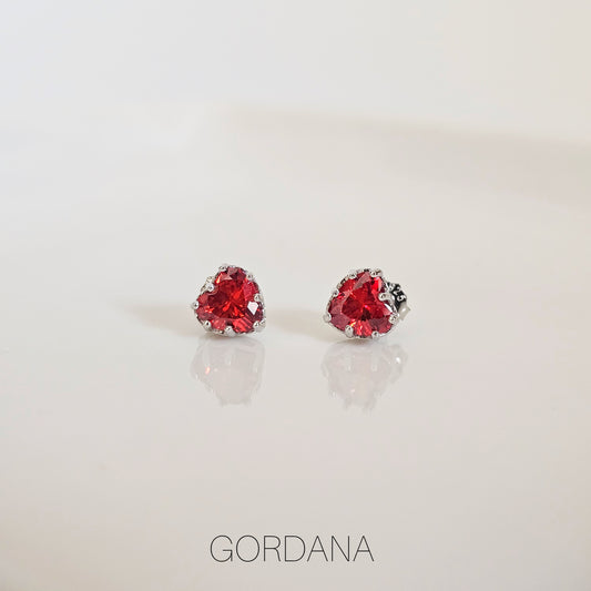 Scarlet red heart-shaped gemstone earrings in silver stainless steel, fashion jewelry for unisex style.