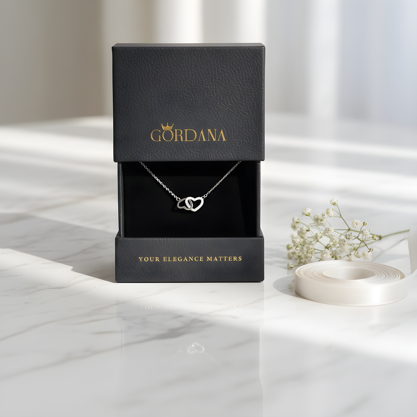 Interlocking Heart Necklace — Sterling Silver with Cubic Zirconia