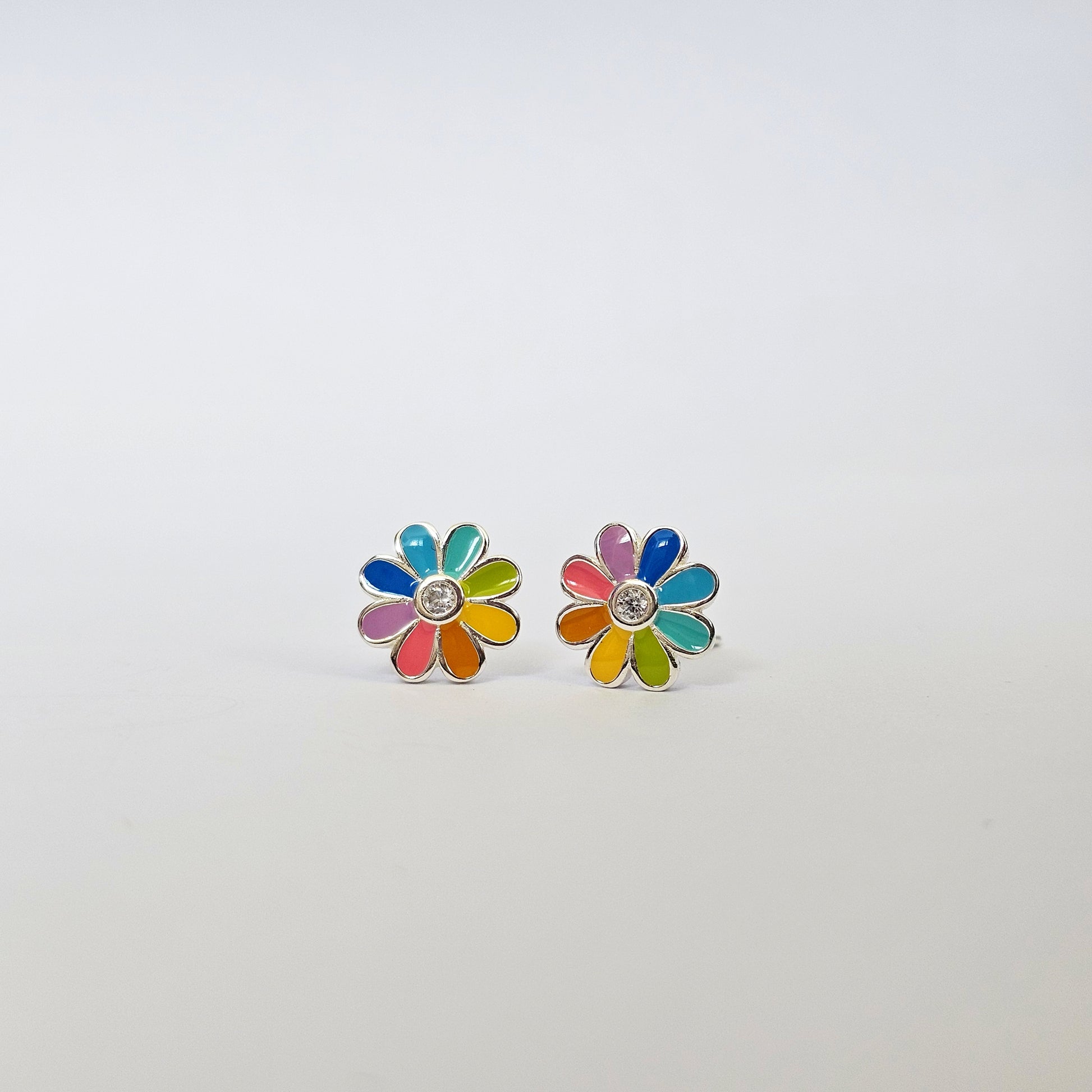 Silver stud earrings shaped like colorful daisy flowers with multicolored gemstone petals, stainless steel jewelry, unisex.