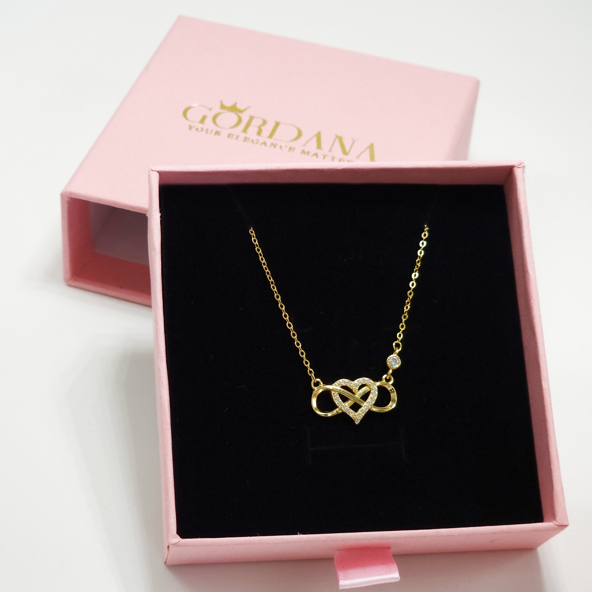18k gold plated stainless steel necklace with intertwined heart design, elegant unisex silver jewelry, fashion gemstone.