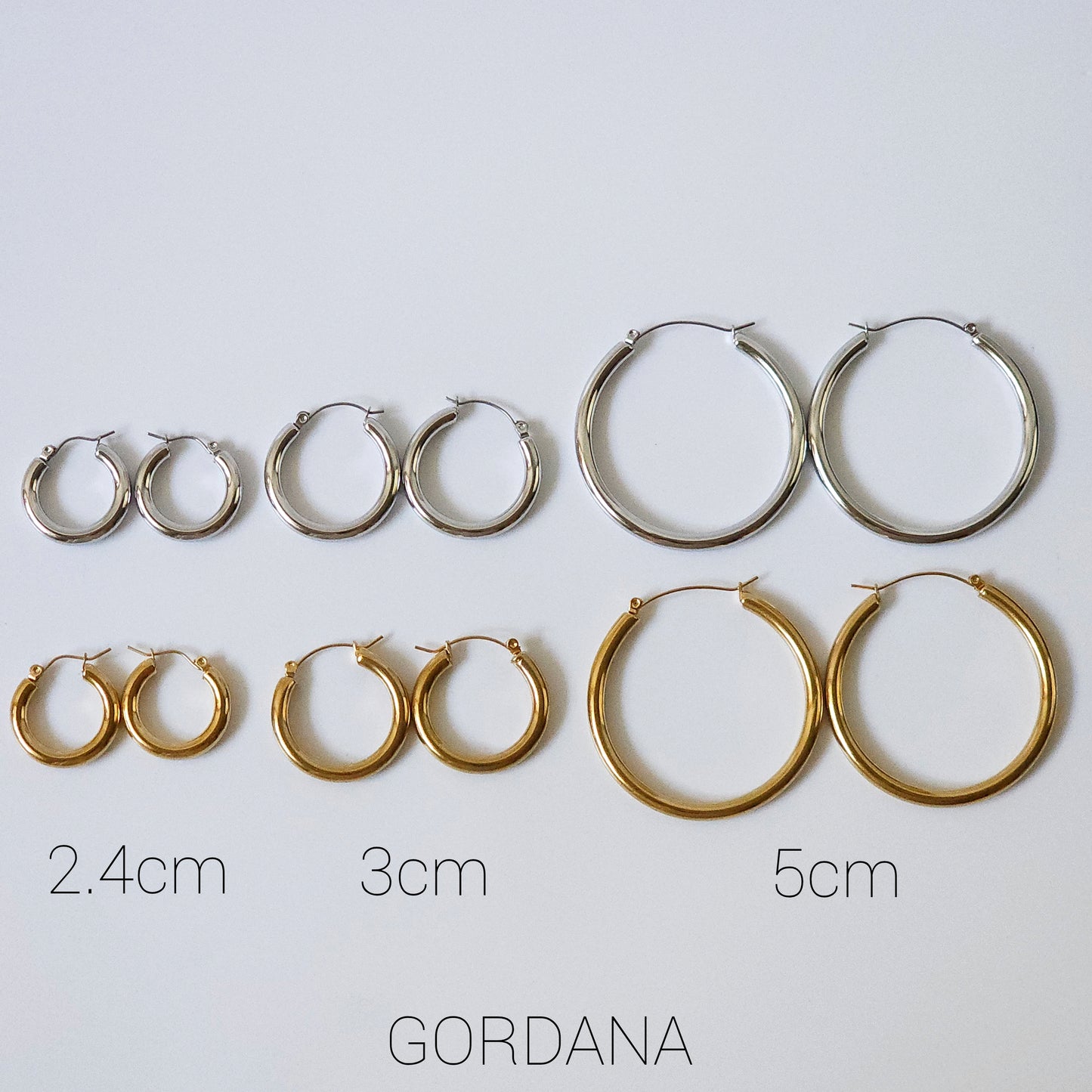 Set of stainless steel jewelry with silver and gold 2.4cm, 3cm, and 5cm hoop earrings, elegant unisex fashion jewelry,.